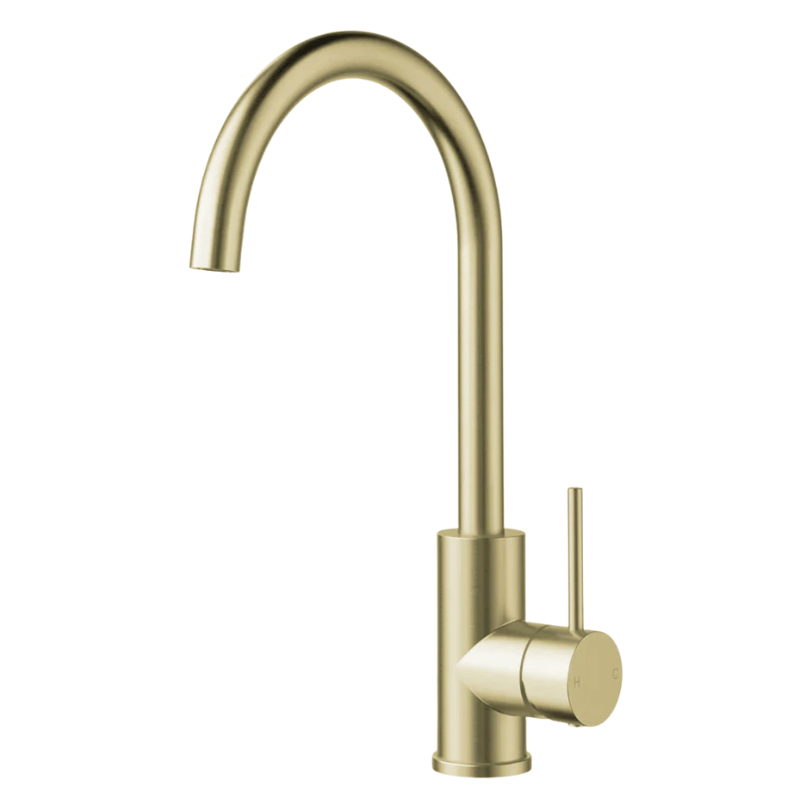Gold kitchen faucet on a white background