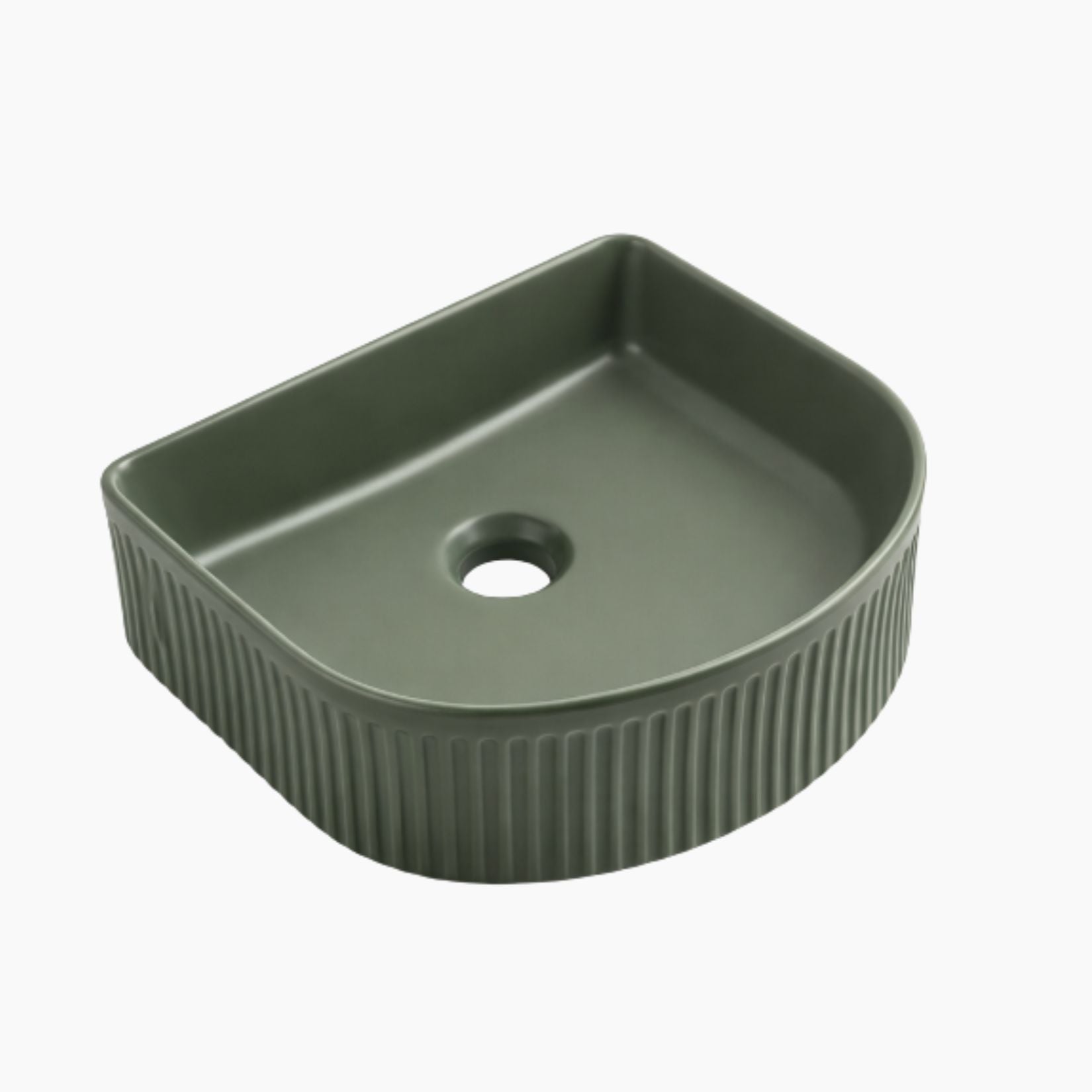 Green ceramic sink basin with ribbed design on a white background