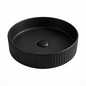 Black round ceramic basin sink on a white background